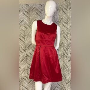 Womens Black Collection red “satin” style dress, knee length medium sleeveless